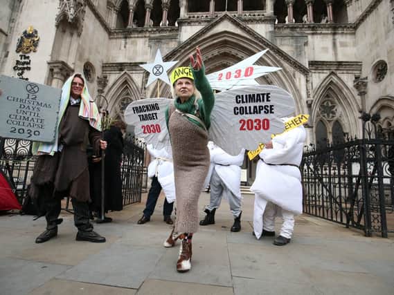 Environmental campaigner Joe Corre and his mum Dame Vivienne Westwood outside the High Court in London where a challenge is being made to the Government's change in the planning guidance on fracking