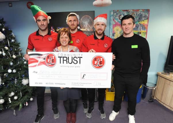 Fleetwood Town FC visit children and staff at Brian House Children's Hospice. L-R are Craig Morgan, sister Carol Wylde, Ash Eastham, Paddy Madden and Joey Barton.