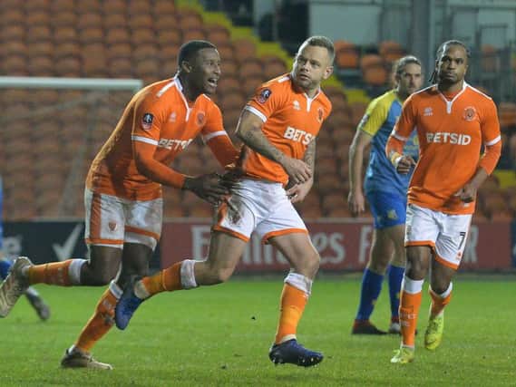 Jay Spearing celebrates his extra-time winner from the penalty spot