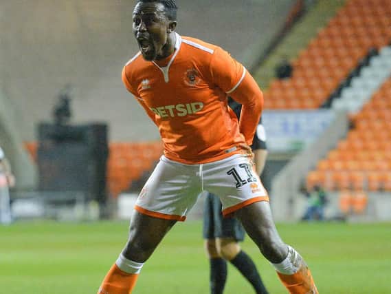 Joe Dodoo celebrates scoring Blackpool's second