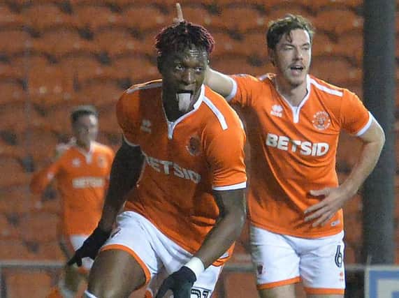 Armand Gnanduillet celebrates scoring Blackpool's first goal of the night