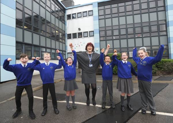 Mereside Primary are celebrating after being named the best school in Blackpool for developing children during the junior years in recent SATS.  Headteacher Sarah Bamber celebrates with L-R Carson McKenzie, Mason Scott, Mayzee Everett, Son Wend, Freya Lambert and Molly Livesey.