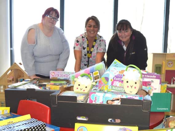 Michelle Green, Dawn Geraghty and Sue Ridley with donated toys at Blackpool Victoria Hospital's children's ward last Easter