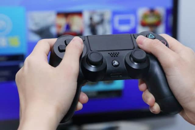 A stock image of a Playstation 4 controller