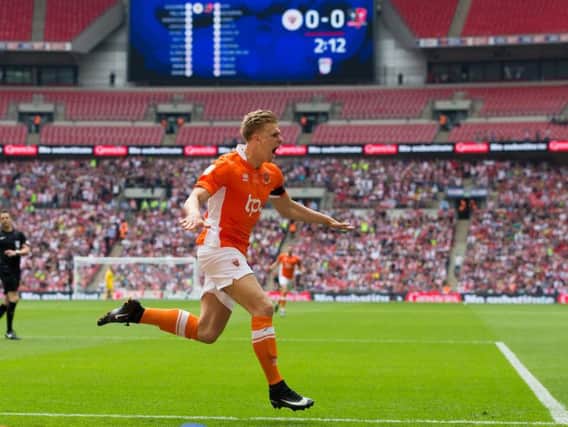Brad Potts celebrating scoring at Wembley in his last game for Blackpool
