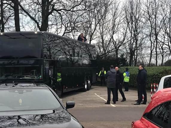 The Blackpool fan sat on top of Arsenal's team bus