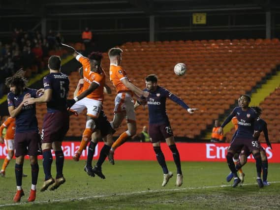 Paudie O'Connor heads towards goal in Blackpool's FA Cup defeat to Arsenal