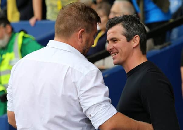 Joey Barton paid tribute to Oxford United manager Karl Robinson