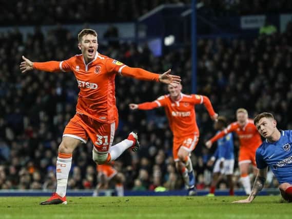 Blackpool's Chris Long celebrates scoring his side's winning goal on his debut