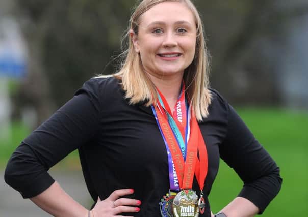Emma Pilgrim ran a 10k event every month last year for charity