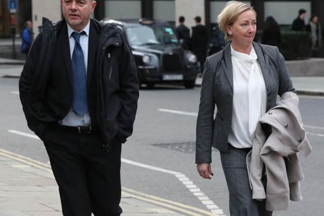 Detective Constables Lee Pollard (left) and Sharon Patterson leaving the Old Bailey in London, where they are are accused of forging documents and concealing evidence over a three-year period, sabotaging a string of child sex abuse investigations.
