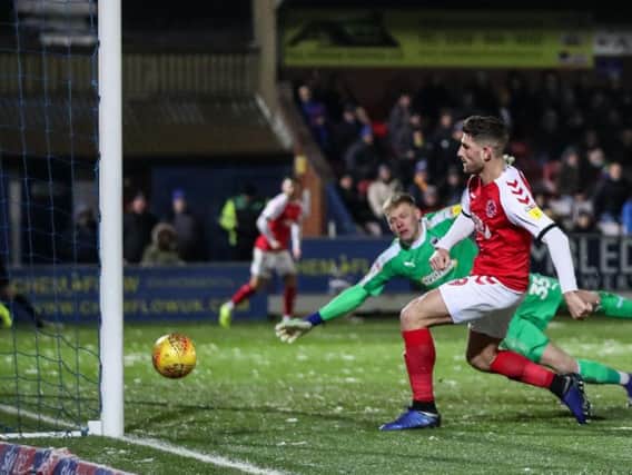 Ched Evans scores his and Fleetwood's second goal at Wimbledon