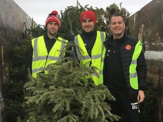 Fleetwood Town Academy staff on their Christmas tree collection round.