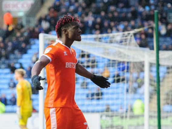 Armand Gnanduillet celebrates scoring Blackpool's second goal at Coventry