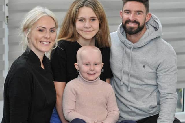 Erin, four, who has Alopecia pictured with her parents Jamie and Tom Didlock and her older sister, Grace, 11, at their Thornton home