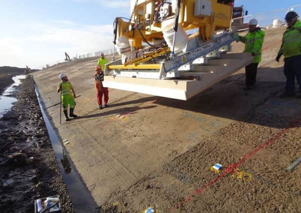 The first pre-cast concrete stepped units are  installed by contactors VBA at Fairhaven Lake as work continues on the Fylde sea defences project