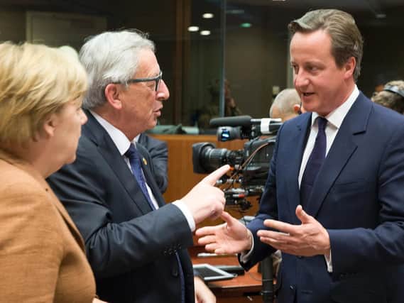 David Cameron (right) with  Angela Merkel and Jean-Claude Juncker