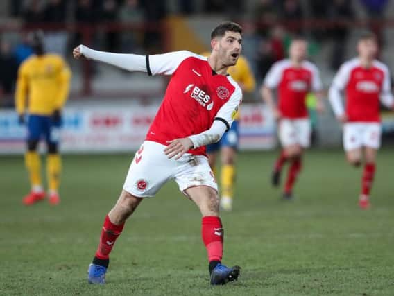 Ched Evans thanks the Fleetwood fans for their support by scoring Town's winning goal