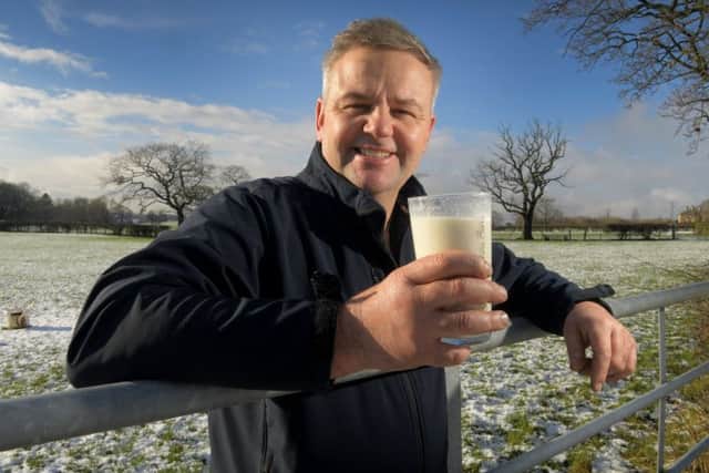 NW Dairy Board chairman Graham Young raises a glass of milk to toast the Februdairy campaign