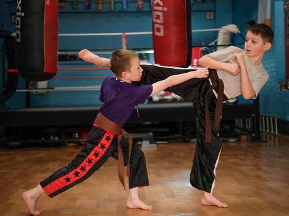 Great Britain kickboxers JJ Shingleton (right) and Austin Russell at Zen Martial Arts