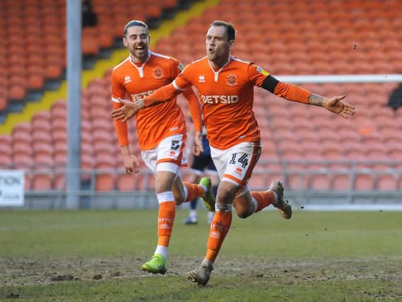 Harry Pritchard celebrates after wrapping up the win for Blackpool two minutes from time