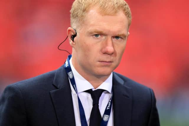 Paul Scholes is sure Sir Alex Ferguson is just a phone call away should he seek advice in his managerial bow.