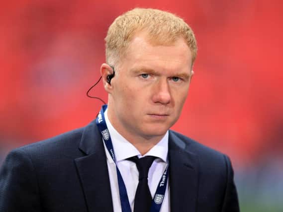 Paul Scholes is sure Sir Alex Ferguson is just a phone call away should he seek advice in his managerial bow.