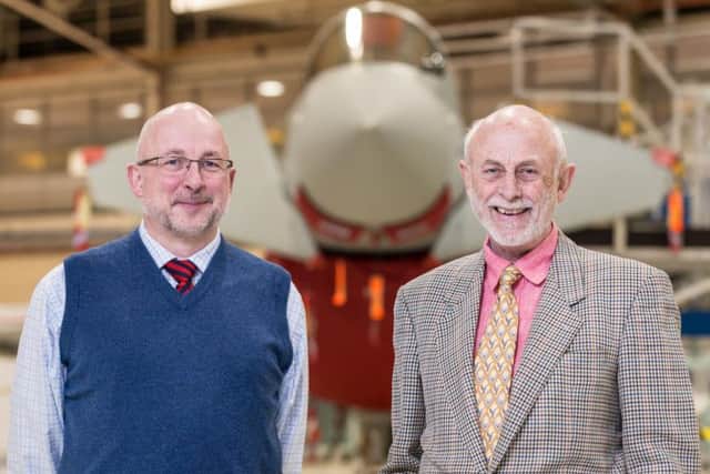 Test pilot Dave Eagles with his son Simon pictured in the Eurofighter assembly building at Warton