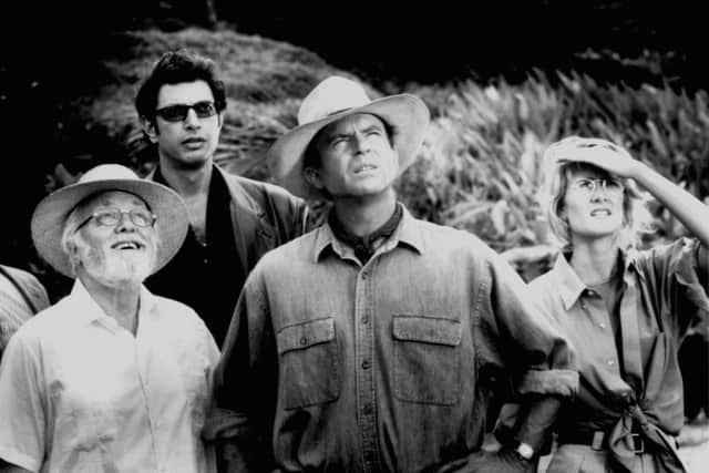 John Hammond (Sir Richard Attenborough) shows Ian Malcolm (Jeff Goldblum), Alan Grant (Sam Neill) and Ellie Sattler (Laura Dern) the secret of Jurassic Park.