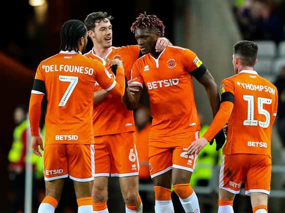 Armand Gnanduillet celebrates giving Blackpool a first-half lead