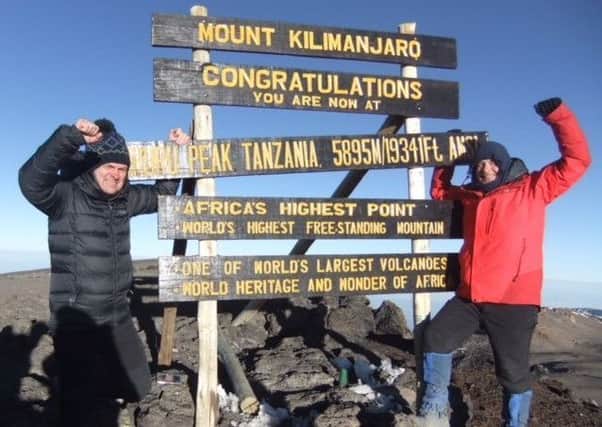 Resort detective Jason Wainwright, and his friend Craig Mitchell, climbed Kilimanjaro to raise money for Breast Cancer Care.
The 49-year-old, above right, organised the trip after 25 years of dreaming about it, and after being inspired by his wife Lisa, 46, beating cancer.