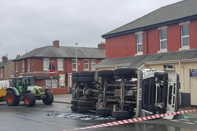 A cement mixer has overturned on George Street in Blackpool.