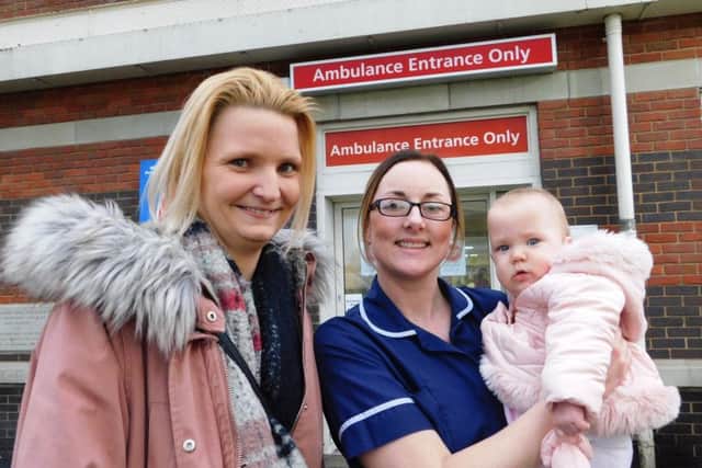 Lisa Davey, 27, with Blackpool Victoria Hospital A&E sister Danielle McLardie, and 10-month-old Danielle Alice Davey