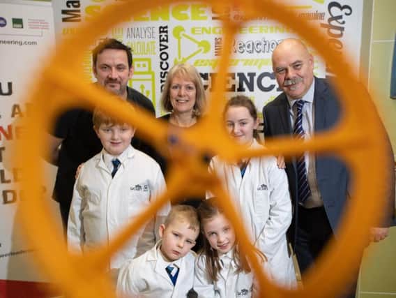 (L-R top) Senior lecturer in computer aided engineering Dr Matt Dickinson, UCLan Joint Institutional Lead Dr Lynne Livesey and Liam Weatherill, Regional Director Primary Engineer, with children from St Andrews C E in Preston and Salesbury CE