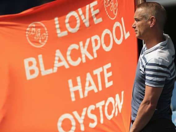 Fans have long been protesting against Owen Oyston's running of Blackpool FC, with many refusing to return to Bloomfield Road until he has left the club. Photo: Getty Images