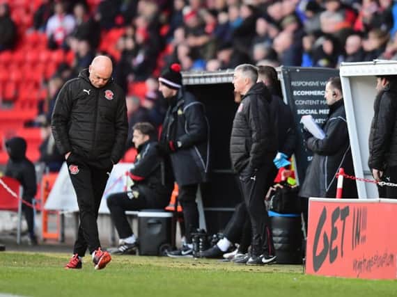 Uwe Rosler looks glum at Doncaster Rovers in what was to be his last game as Fleetwood Town head coach