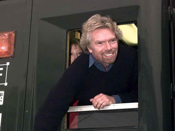 Richard Branson's Virgin Rail Group has won the bid for the West Coast rail line