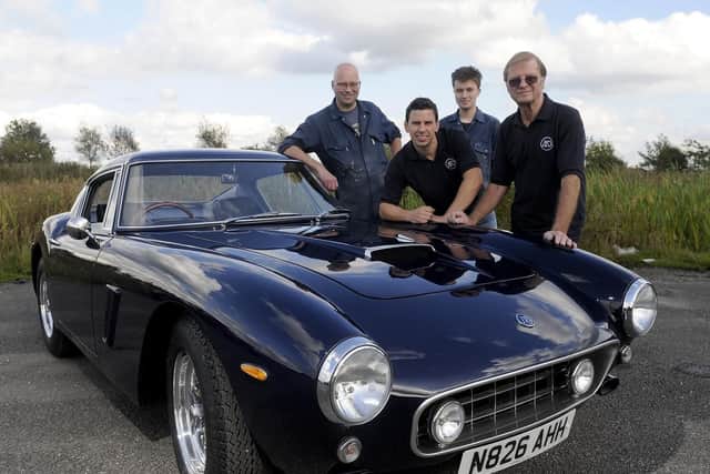 The team with one of the finished Mirage GTs