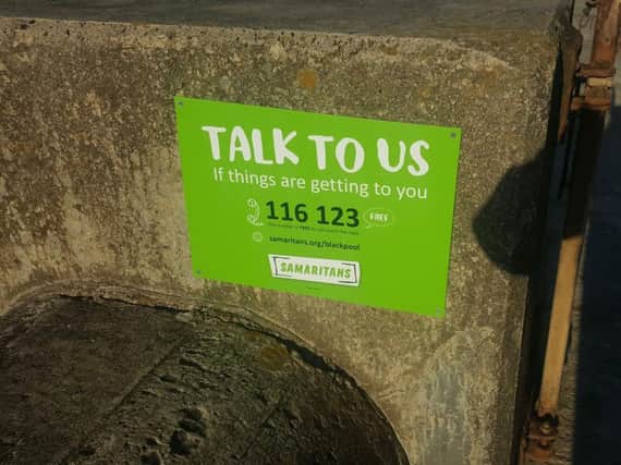 One of the Samaritans signs