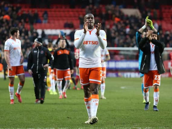 Donervon Daniels applauds the Blackpool fans at full time