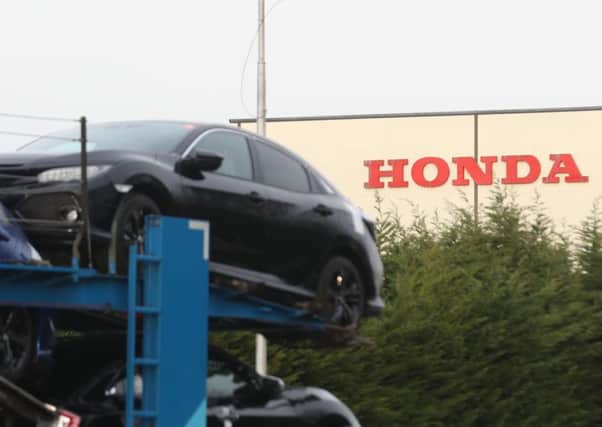 A car transporter at the Honda plant in Swindon, which the company is planning to close with the loss of more than 3,000 jobs. Pic: Steve Parsons/PA Wire.
