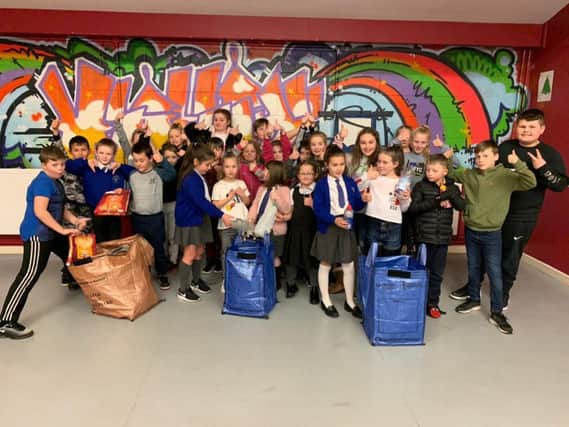 The youngsters at Blackpool Boys and Girls Club with their newly acquired recycling bags