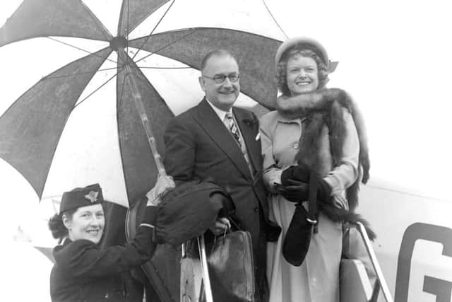 Actress Anna Neagle and husband Herbert Wilcox  arrive at Blackpool's Squires Gate Airport in 1949 ahead of switching on the Illuminations