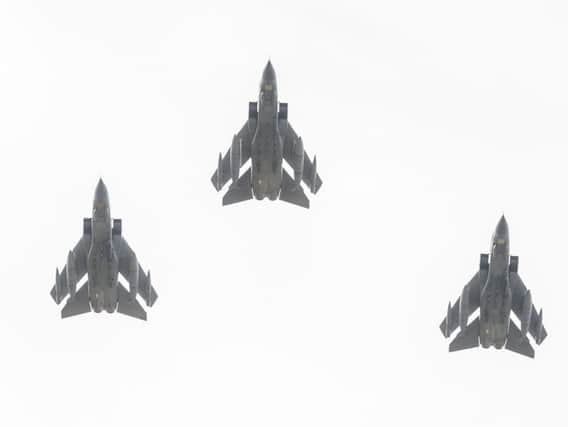 The three RAF Tornados fly over Warton