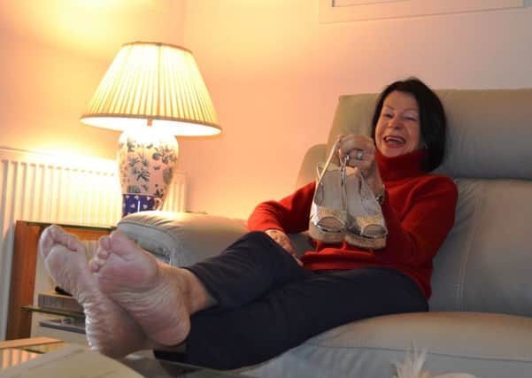 Janet Riggs is delighted to be able to wear her favourite shoes again after corrective surgery.