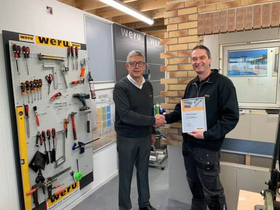 Martyn Strangwick, right,  Technical and Training Manager who has 31 Years service with the family run Weru UK business in Blackpool, received the accreditation from Weru UK founder Graham Lindsay