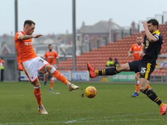 Harry Pritchard's shot is deflected wide on a disappointing day for Blackpool against Oxford United