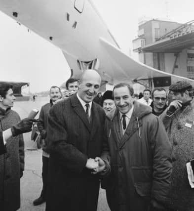 The Concorde 001 makes its first public appearance in Toulouse, France, December 11, 1967.  Pictured are test pilots Andre Turcat (left) and Brian Trubshaw. (Photo by Reg Lancaster/Daily Express/Getty Images)
