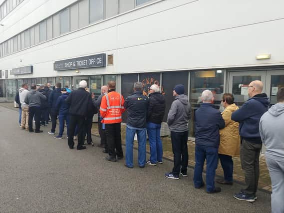 Pool fans queue for tickets for the Southend game
