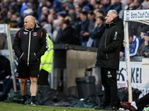 Gary Brabin and Terry McPhillips watch on unimpressed